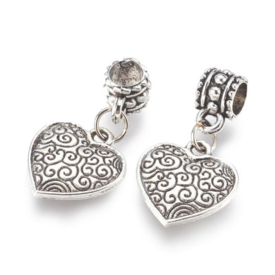 Antique Silver Alloy European Dangle Charms, Heart Charms for Jewelry Making.  Size: Pendant: 16x15mm, with Bail the size is 27mm,  Hole: 5mm, Qty: 1pcs/package.   Material: Alloy Heart Shaped Charms. Silver Color with Bail and Jump Ring. Cab be used as a Charm or as a Pendant.