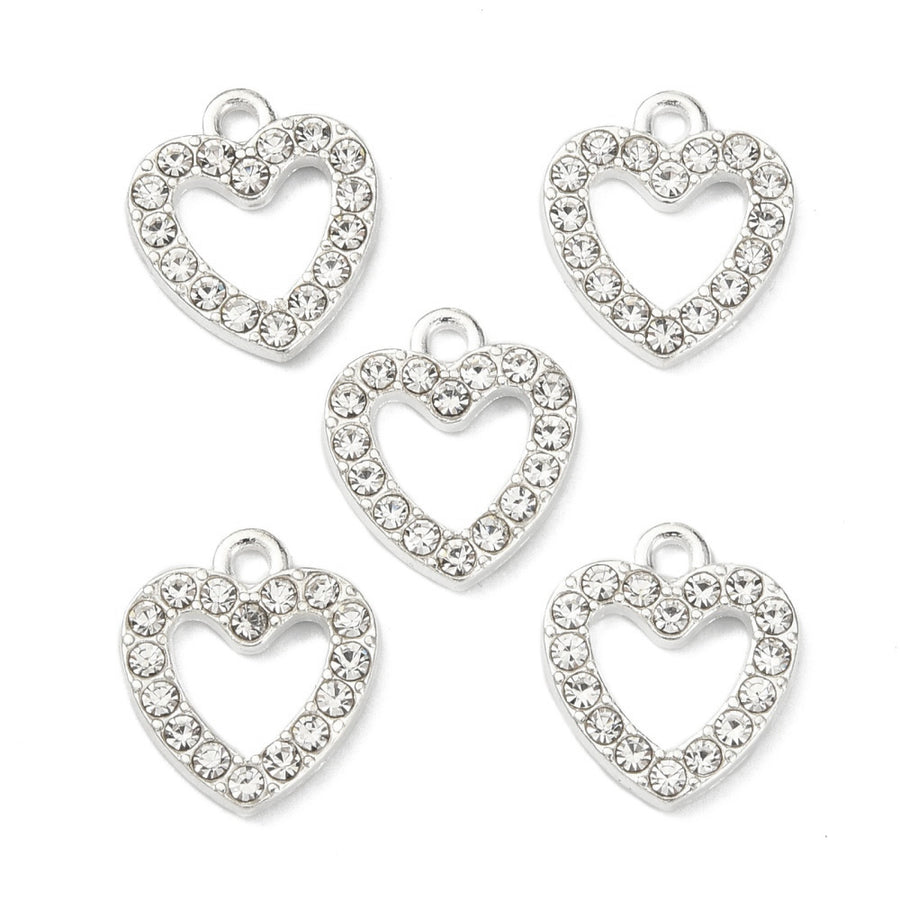Silver Alloy Rhinestone Heart Charms for Jewelry Making.  Size: 14mm Length, 12.5mm Width, 2.5mm Thick, Hole: 2mm, Qty: 5pcs/package.   Material: Alloy Rhinestone Crystal Heart Shaped Charms. Silver Color with Clear Rhinestones. Shinny Polished Finish.