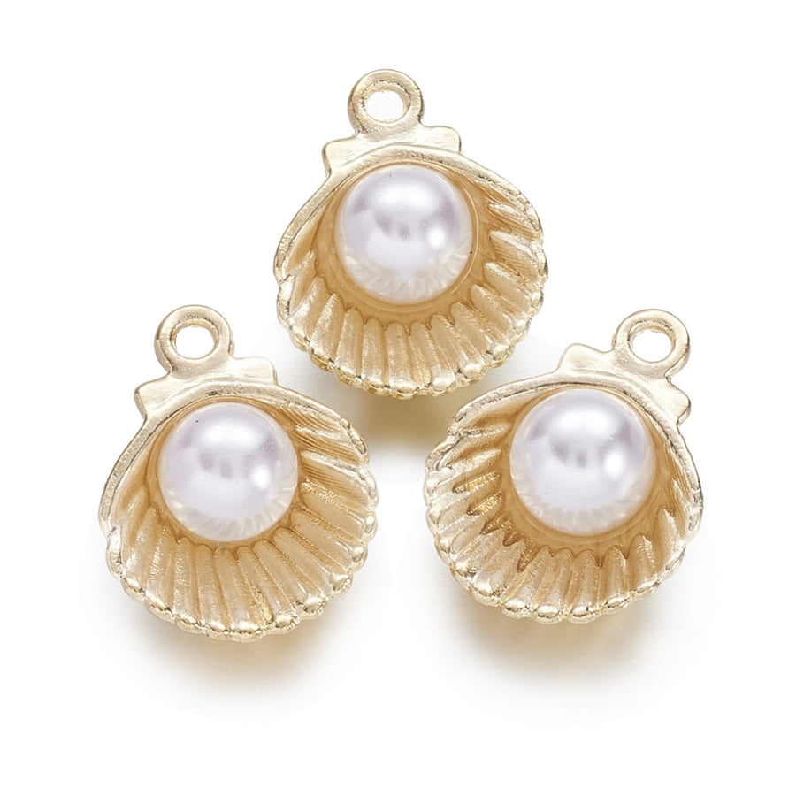 Sea Shell Charms with Acrylic Pearl Charm, Antique Gold Colored for DIY Jewelry Making. Charms for Bracelet and Necklace Making.  Size: 15mm Length, 11mm Width, 7mm Thick, Hole: 1.5mm, Quantity: 4pcs/package.  Material: Alloy (Lead and Nickel Free) Charms. Antique Gold Color. Shinny Finish.