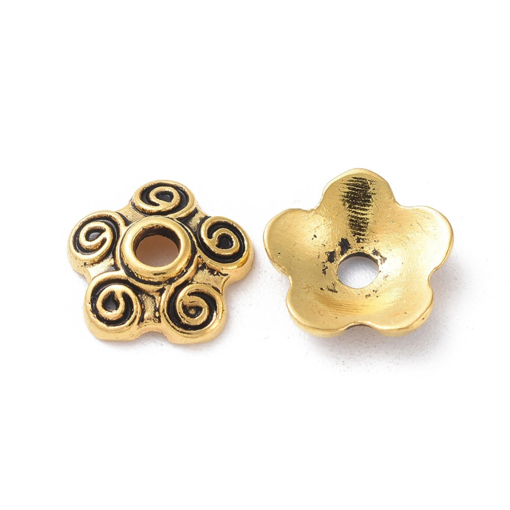 Five Petal Alloy Flower Spacer Beads. Flower Shaped Bead Caps, Gold Color. Flower Spacers for DIY Jewelry Making Projects.   Size: 10mm Diameter, 3mm Thick, Hole: 2mm, approx. 25pcs/package.  Material: Alloy Flower Bead Caps. Antique Gold Color. Cadmium, Lead and Nickel Free.