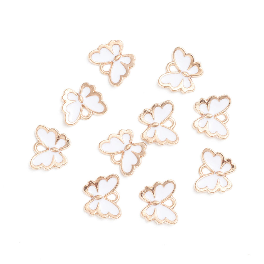 Gold Plated Alloy Charm. White Enamel Butterfly Charms for DIY Jewelry Making.  Size: 10mm Length, 13mm Width, 2mm Thick, Hole: 1mm, Quantity: 10 pcs/package.  Material: Alloy (Lead and Nickel Free) Charms. Light Gold Plated with White Enamel.