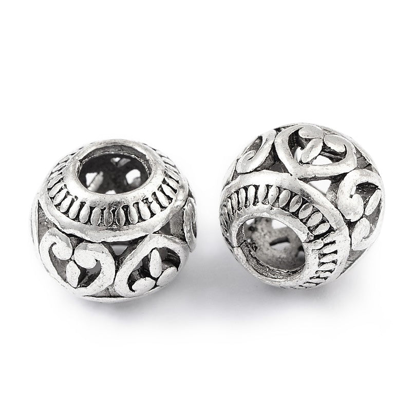 Large Hole European Metal Spacer Beads, Alloy Beads with a Design, Silver Color, Round Rondelle Shape for DIY Jewelry Making.   Size: 11mm Diameter, 9mm Thick, Hole: 4.5mm, Quantity: 5pcs/package  Material: Alloy European Metal, Large Hole Beads. Antique Silver Color with a Pattern.
