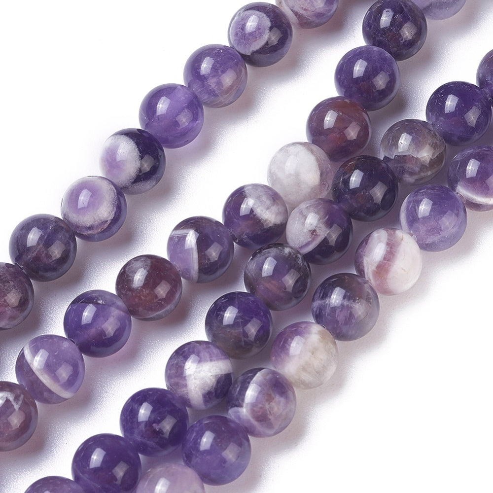 Natural Amethyst Crystal Beads, Round, Purple Color. Semi-Precious Gemstone Beads for DIY Jewelry Making. Gorgeous, High Quality Crystal Beads.  Size: 10mm Diameter, Hole: 1mm; approx. 40-41pcs/strand, 15" Inches Long.  Material: Genuine Natural Amethyst Crystal Beads. Purple with Clear Marking. Polished, Shinny Finish. 