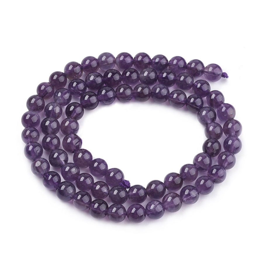 Natural Amethyst Crystal Beads, Round, Purple Color. Semi-Precious Gemstone Beads for DIY Jewelry Making. Gorgeous, High Quality Crystal Beads.  Size: 6mm Diameter, Hole: 1mm; approx. 64pcs/strand, 15" Inches Long.  Material: Genuine Natural Amethyst Beads, Quality Crystal Beads. Dark Purple Color. Polished, Shinny Finish.   Amethyst Properties: Amethyst is the Symbol of Peace, Cleansing and Calming Energy.