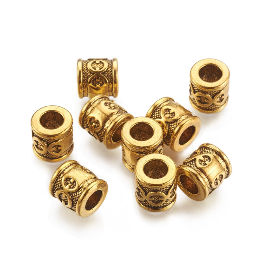Tibetan Tube Spacer Beads, Antique Gold Color. Gold Column/Tube Spacers for DIY Jewelry Making Projects. High Quality, Classy, Non-Tarnish Spacers for Beading Projects. Antique Gold Tibetan Style Alloy Column/Tube Spacer Beads. Shinny Finish. 100% Lead and Nickel Free Spacers.
