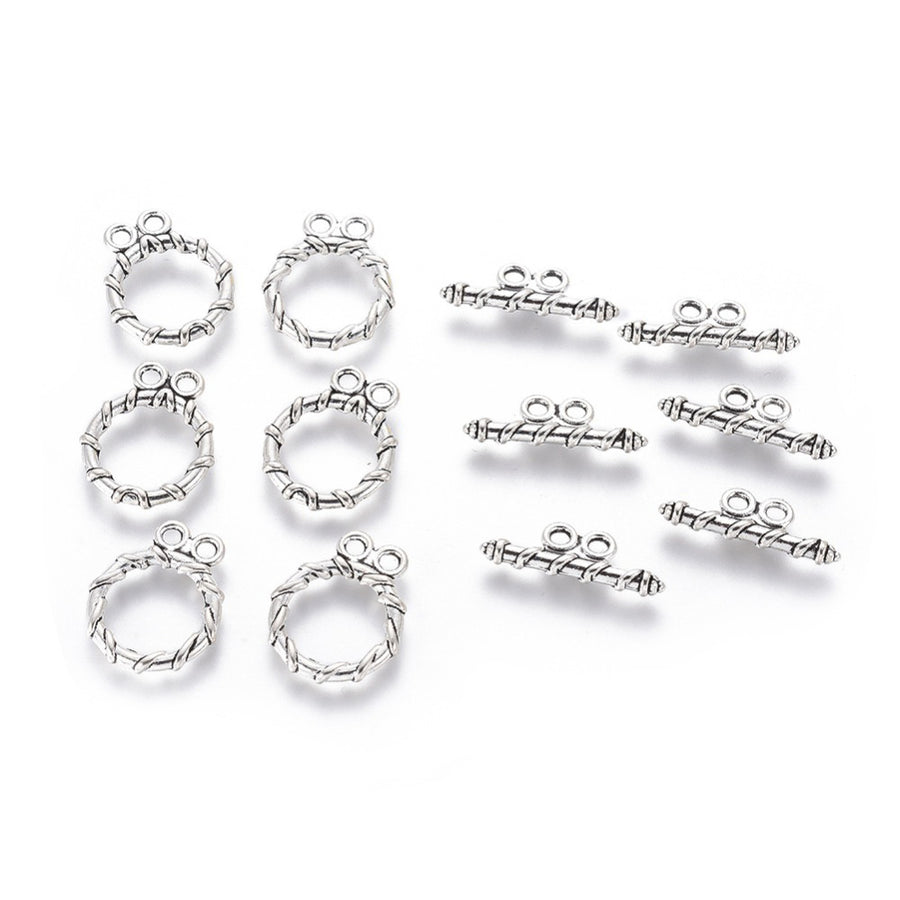 Tibetan Toggle Ring Clasp for DIY Jewelry Making. Antique Silver Color with Design, Round Clasps.  Size: Ring: 18x15mm, Bar: 20x2mm, Hole: 2mm, 5 set/package.  Material: Alloy Toggle Clasps, Cadmium, Nickel and Lead Free, Antique Silver Color Clasp. 