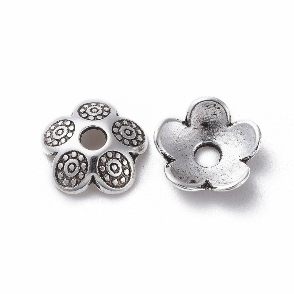 Antique Silver Bead Caps, Alloy Flower Spacer Beads. Flower Shaped Bead Caps, Silver Color. Flower Spacers for DIY Jewelry Making Projects.   Size: 8mm Diameter, 2mm Thick, Hole: 2mm, approx. 25pcs/package  Material: Alloy Flower Bead Caps. Antique Silver Color. Lead, Cadmium and Nickel Free.