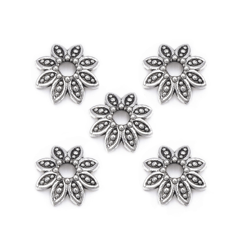Multi Petal Alloy Flower Spacer Beads. Flower Shaped Bead Caps, Silver Color. Flower Spacers for DIY Jewelry Making Projects.   Size: 10mm Diameter, 2.5mm Thick, Hole: 1.5mm, approx. 25pcs/package.  Material: Alloy Multi Petal Flower Bead Caps. Antique Silver Color. Lead, Cadmium & Nickel Free.