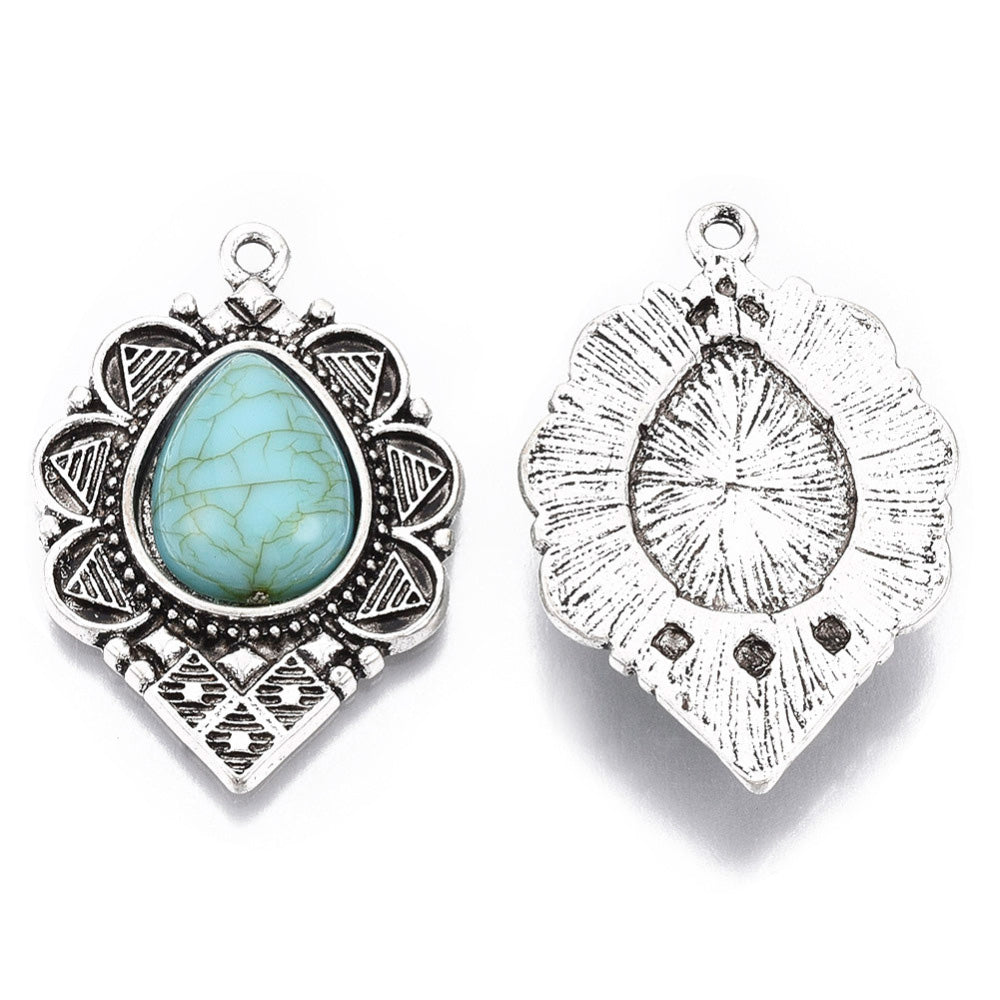 Antique Silver Synthetic Turquoise Gemstone Pendants, Turquoise Color. Teardrop Pendant for DIY Jewelry Making. Great for Necklaces.   Size: 36mm Length, 24mm Wide, 6mm Thick, Hole: 1.8mm, 1pcs/package.   Material: Synthetic Turquoise Stone Pendant, Antique Silver Plated Alloy Pendant. Tear Drop shaped Pendants. Shinny, Polished Finish. 