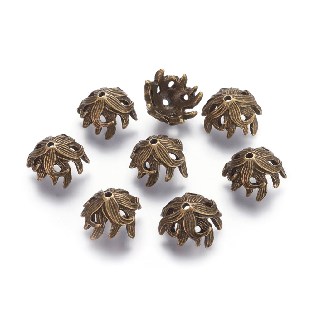 Flower shape Large Bead Caps, Alloy Beads Antique Bronze Color for DIY Jewelry Making.   Size: 10mm Diameter, 15mm Length, 15mm Width, Hole: 2mm, Qty: 5pcs/package.  Material: Alloy Bead Caps. Antique Bronze Color with a Pattern.