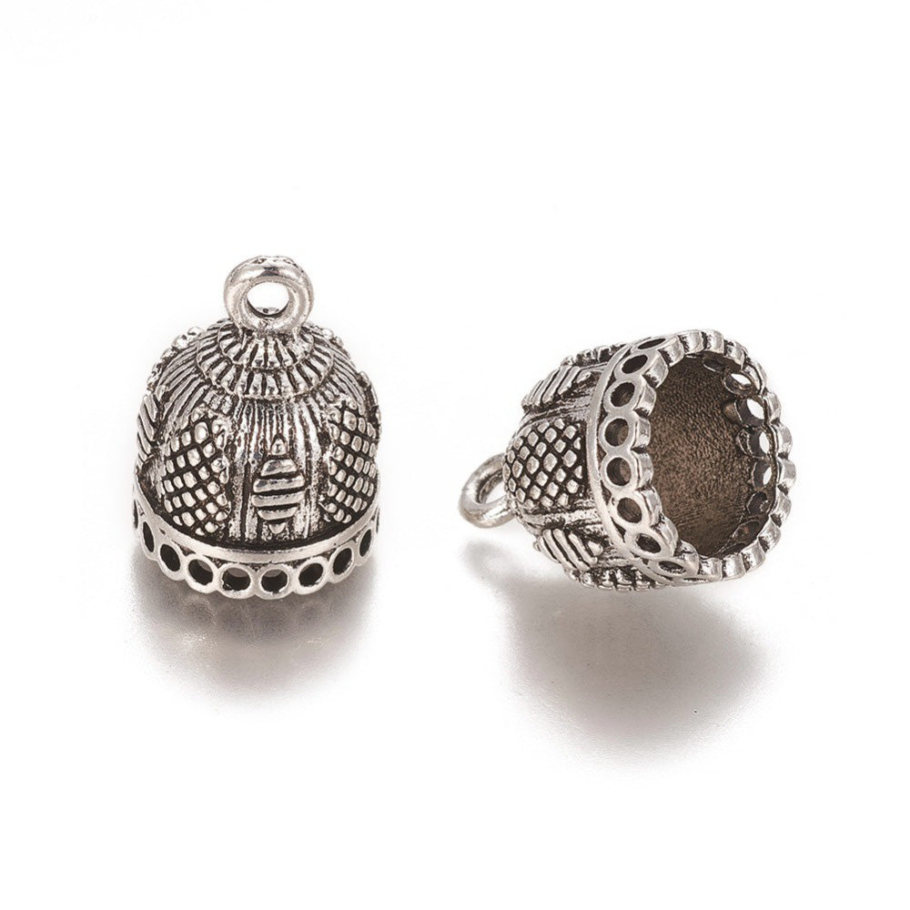 Large Tassle Cap, Bead Cone, Antique Silver Colored Cones for DIY Jewelry Making. Add the perfect Finishing Touch to Your Jewelry Designs with these Stylish Bead Cap Bail.  Size: 19mm Diameter (12mm Inner Diameter), 15mm Length, Hole: 1mm, Qty: 1pcs/bag.  Material: Alloy (Lead and Nickel Free) Bead Cone. Antique Silver Color. Shinny Finish.