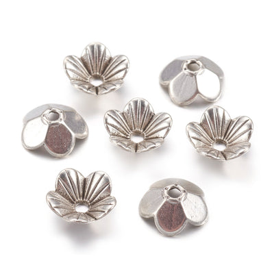 5 Petal Alloy Flower Spacer Beads. Flower Shaped Bead Caps, Silver Color. Flower Spacers for DIY Jewelry Making Projects.   Size: 10mm Length, 10mm Width, 3mm Thick, Hole: 1.5mm, approx. 20pcs/package.  Material: Alloy 5 Petal Flower Bead Caps. Antique Silver Color. Lead, Cadmium & Nickel Free.