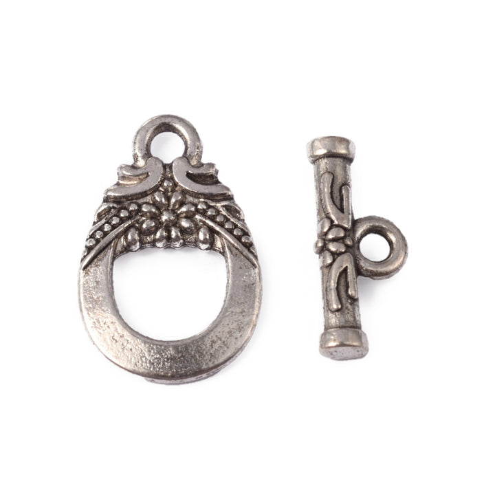 Antique Silver Teardrop Shaped Toggle Clasps for DIY Jewelry Making. Unique Toggle Clasp.  Size: 19mm Length, 11mm Width; Bar: 14x6mm, Hole: 2mm, 5 set/package.  Material: Silver Color Alloy Toggle Clasps, Teardrop shape. Cadmium, Nickel and Lead Free.   Usage: These Clasp are used to finish off jewelry. Add a unique touch to your jewelry designs.