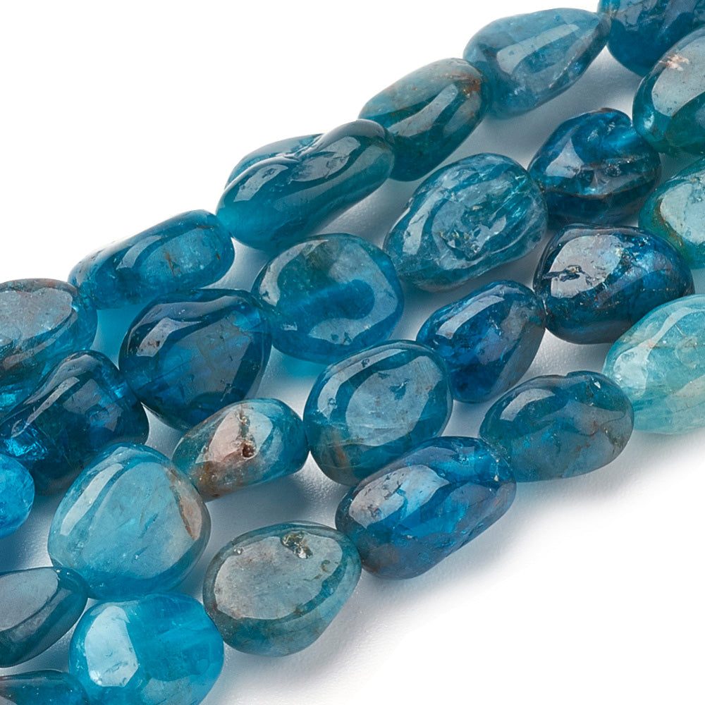 Apatite Gemstone Beads, Oval, Tumbled Stone, Nuggets, Blue Color. Semi-Precious Gemstone Beads for Jewelry Making.   Size: 5-12mm Length, 5-8mm Wide, 3-5.5mm Diameter, Hole: 1mm; approx. 47pcs/strand, 15" Inches Long.  Material: Genuine Natural Apatite Stone, Tumbled Stone, Nugget Beads. Polished, Shinny Finish.   