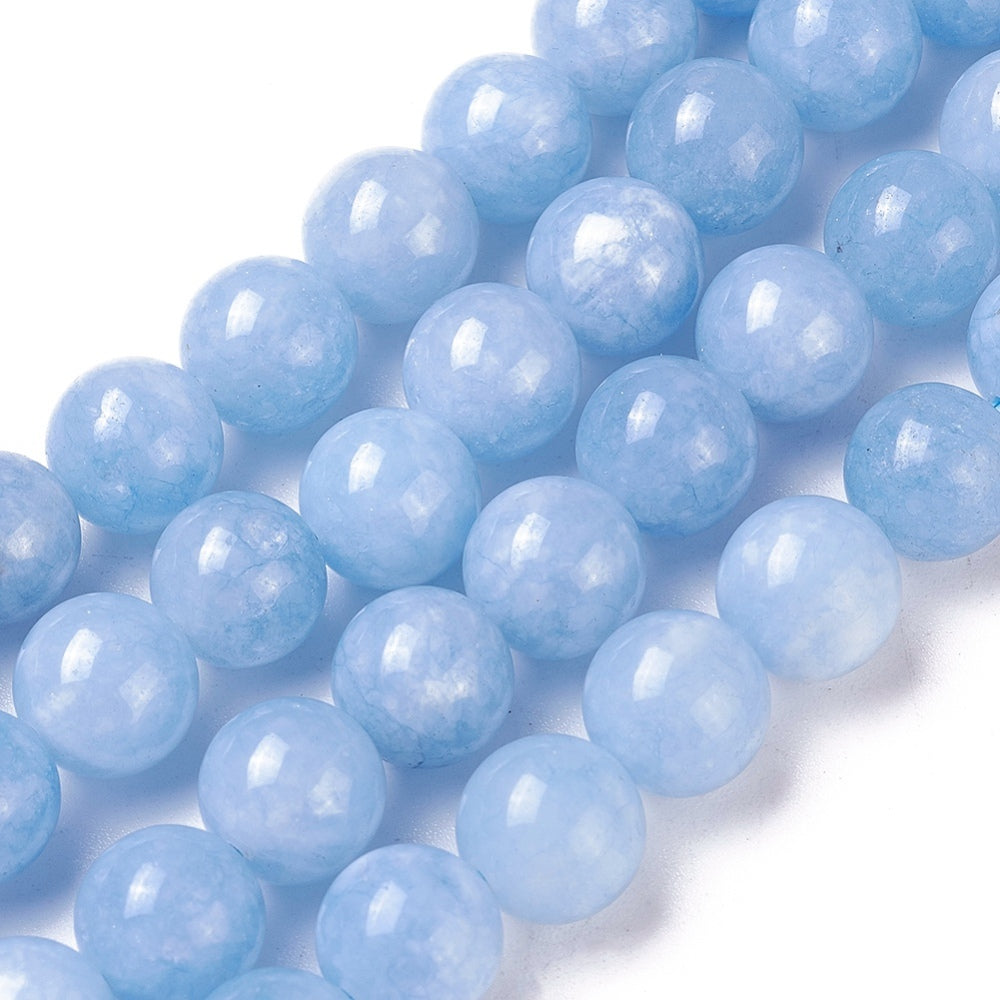 Stunning Aquamarine Natural Jade Beads, Round, Light Blue Color. Semi-Precious Crystal Gemstone Beads for Jewelry Making. Great for Stretch Bracelets. Size: 10mm in Diameter, Hole: 1mm; approx. 37pcs/strand, 15" inches long. Material: Imitation Aquamarine Beads made from Natural Jade dyed Blue Color. Polished, Shinny Finish. bead lot beads and more. beadlotcanada. www.beadlot.com