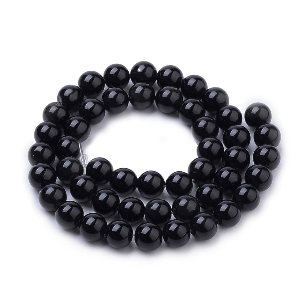 Black Onyx Beads, Black Color. Semi-Precious Gemstone Beads for DIY Jewelry Making.   Size: 8-8.5mm Diameter, Hole: 1mm; approx. 45pcs/strand, 15" Inches Long.  Material: High Quality Black Onyx, Dyed Black Color. Polished, Shinny Finish.