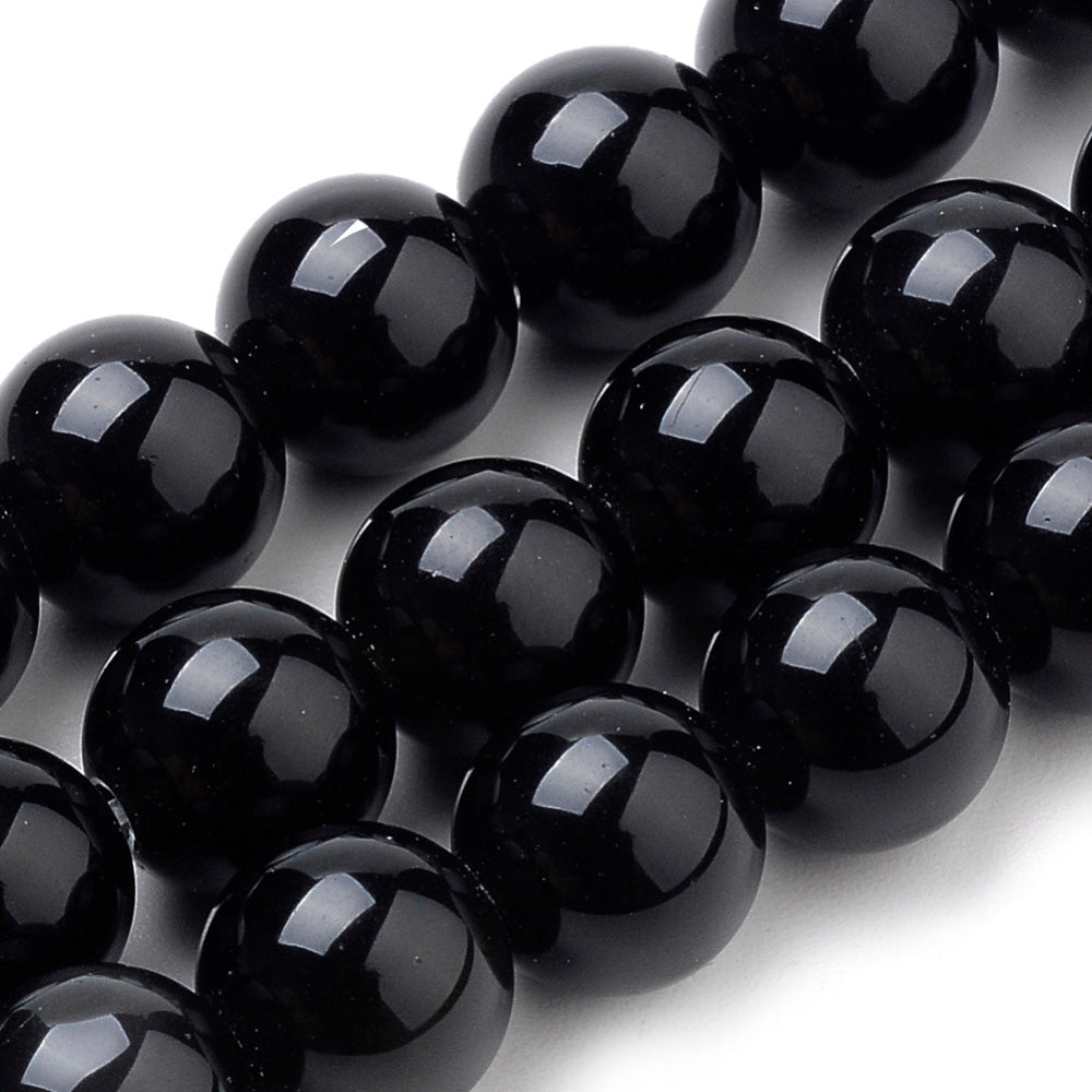 Black Onyx Beads, Black Color. Semi-Precious Gemstone Beads for DIY Jewelry Making.   Size: 12mm Diameter, Hole: 1mm; approx. 31-32pcs/strand, 15" Inches Long.  Material: High Quality Black Onyx, Dyed Black Color. Polished, Shinny Finish.