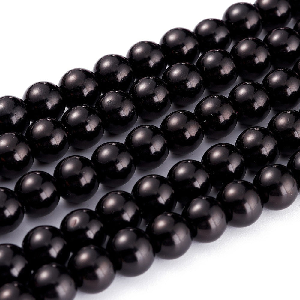 lass Pearl Bead Strands, Round, Black Color. Shinny, Black Pearl Beads for Jewelry.  Size: 8mm in diameter, hole: 1mm; approx. 105pcs/strand, 32" Inches Long.  Material: The Beads are Made from Glass. Glass, Pearlized, Round, Black Color Beads. Polished. Shinny Finish.