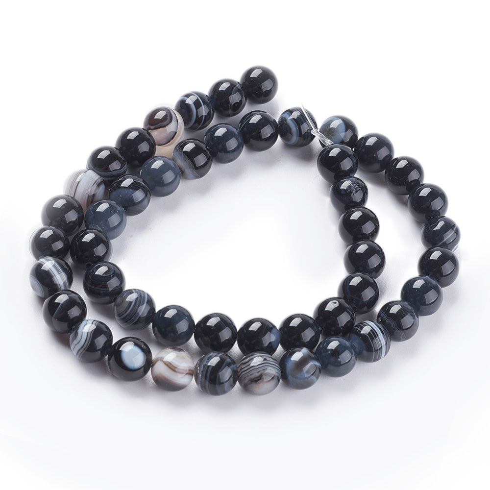 Black Striped Agate Beads, Round, Dyed, Black Agate.  Semi-Precious Gemstone Beads for Jewelry Making. Great for Stretch Bracelets and Necklaces.  Size: 8mm Diameter, Hole: 1mm; approx. 46pcs/strand, 14" Inches Long.  Material:  Striped Banded Agate Loose Beads Dyed Black Color. Polished, Shinny Finish.