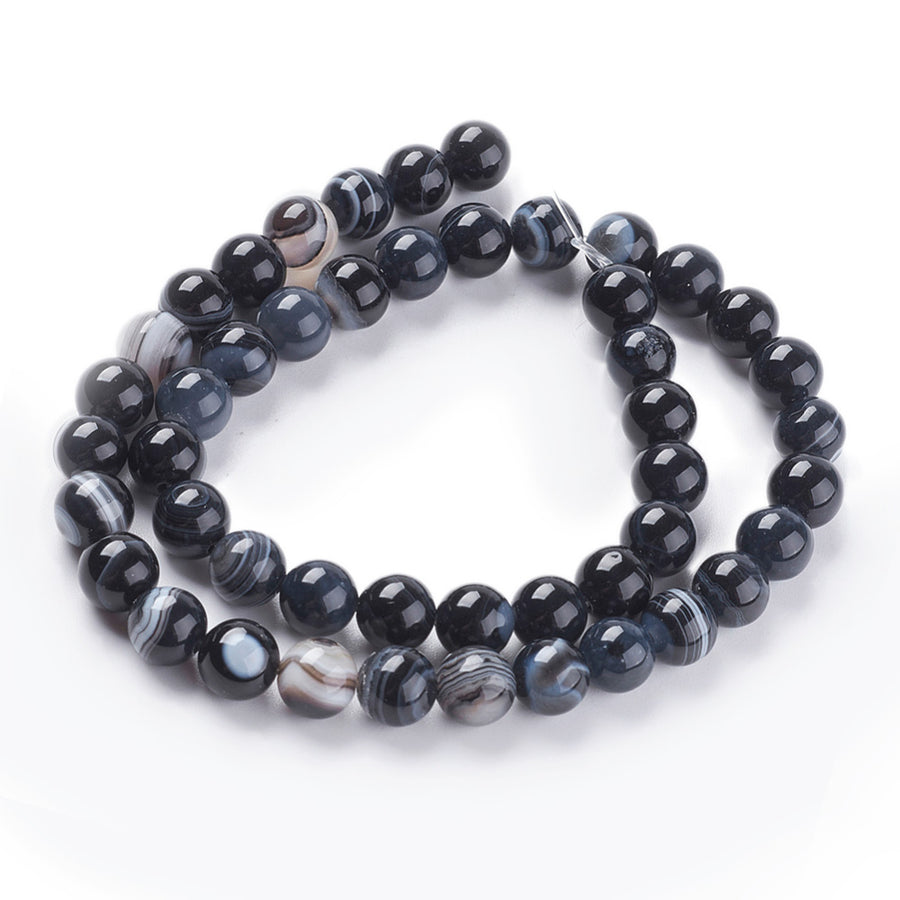 Black Striped Agate Beads, Round, Dyed, Black Agate.  Semi-Precious Gemstone Beads for Jewelry Making. Great for Stretch Bracelets and Necklaces.  Size: 8mm Diameter, Hole: 1mm; approx. 46pcs/strand, 14" Inches Long.  Material:  Striped Banded Agate Loose Beads Dyed Black Color. Polished, Shinny Finish.