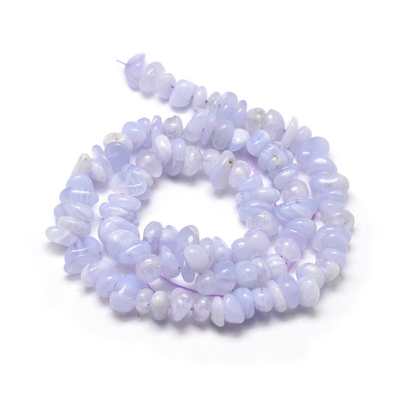 Blue Lace Agate Chip Beads, Pale Blue Colored Semi-Precious Stone Chips Beads for Jewelry Making.  Size: 5~14mm wide, 4~10mm long, Hole: 1mm; approx. 15 inches long.  Material: Genuine Blue Lace Agate Natural Stone Chip Beads. Pale Blue Colored Chip Beads. Polished, Shinny Finish.