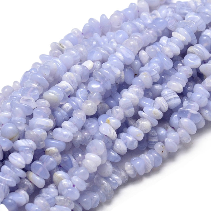 Blue Lace Agate Chip Beads, Pale Blue Colored Semi-Precious Stone Chips Beads for Jewelry Making.  Size: 5~14mm wide, 4~10mm long, Hole: 1mm; approx. 15 inches long.  Material: Genuine Blue Lace Agate Natural Stone Chip Beads. Pale Blue Colored Chip Beads. Polished, Shinny Finish.