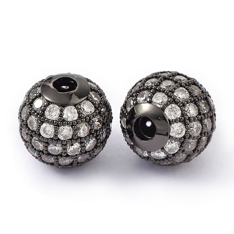 Round Brass Micro Pave Cubic Zirconia Spacer Beads, Gunmetal Black Color Charm Spacers for DIY Jewelry Making. Focal Beads for Bracelet and Necklace Making.  Size: 10mm Diameter, Hole: 2mm, Quantity: 1pcs/package.  Material: Clear Crystal Cubic Zirconia Brass Micro Pave Round Spacer Bead. Gunmetal Black  Color. Shinny, Sparkling Finish. 
