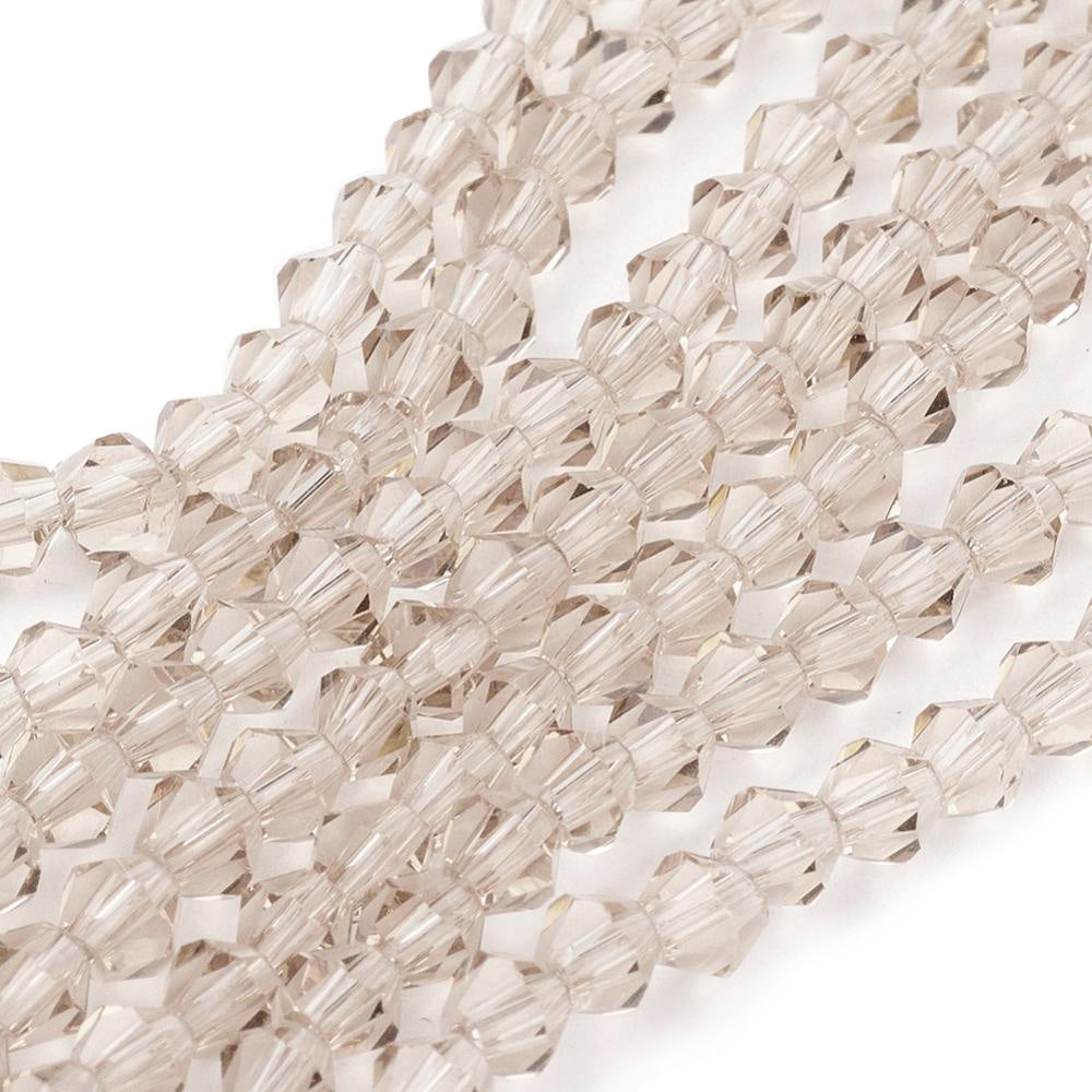 Glass Beads, Faceted, Champagne Color, Bicone, Crystal Beads for Jewelry Making.  Size: 4mm Length, 4mm Width, Hole: 1mm; approx. 65pcs/strand, 13.75" inches long.  Material: The Beads are Made from Glass. Austrian Crystal Imitation Glass Crystal Beads, Bicone, Champagne Beige Colored Beads. Polished, Shinny Finish. 