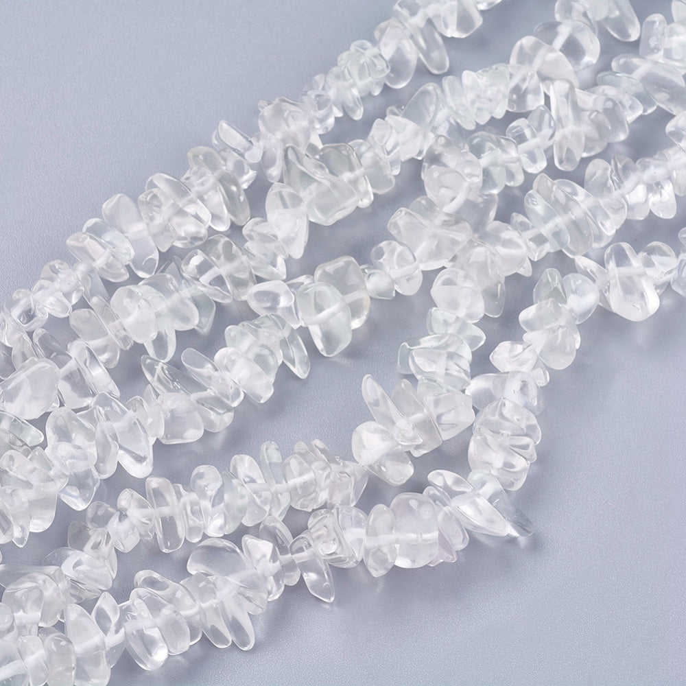 Transparent Clear Quartz Chip Beads. Semi-Precious Stone Chip Beads for Jewelry Making. Affordable High Quality Beads for Jewelry Making.  Size: 4-6mm wide, 4-10mm long, hole: 1mm; approx. 31.5 inches long.  Material: Natural Clear Quartz Chip Beads. Transparent Crystal Quartz Chips. Genuine Clear Quartz Chip Stone Beads. Polished, Shinny Finish.