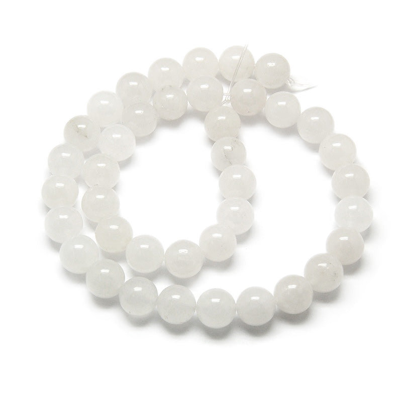 White Jade Beads, Round, Clear White Color. Semi-Precious&nbsp;Crystal Gemstone Beads for Jewelry Making.&nbsp;

Sizes:

6mm Diameter, Hole: 1mm; approx. 61pcs/strand, 15" Inches Long.

8mm Diameter, Hole: 1mm; approx. 45pcs/strand, 15" Inches Long.

10-10.5mm Diameter, Hole: 1.2mm; approx. 35pcs/strand, 15" Inches Long.

Material: Natural White Jade. Clear White Color. Polished, Shinny Finish.

White Jade Properties:&nbsp;White Jade is known for its Calming and Comforting Effect. White Jade is also used to