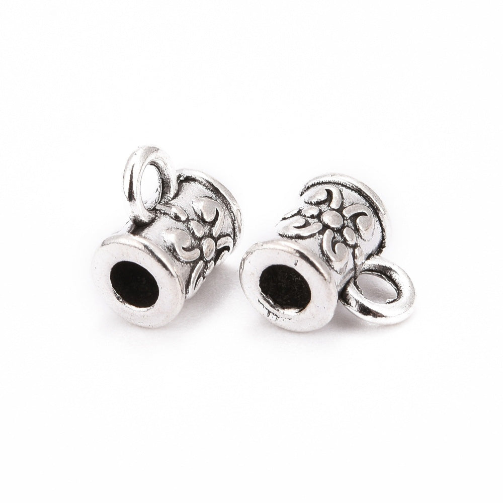 Column Shaped Tibetan Bail Tube Beads, Antique Silver Tube Bails for Jewelry Making.  Size: 5.5mm Diameter, 7.5mm Length Hole: 2.5mm, Quantity: 5pcs/bag.  Material: Alloy (Lead and Nickel Free) Connectors, Bail Beads. Antique Silver Color. Shinny Finish.