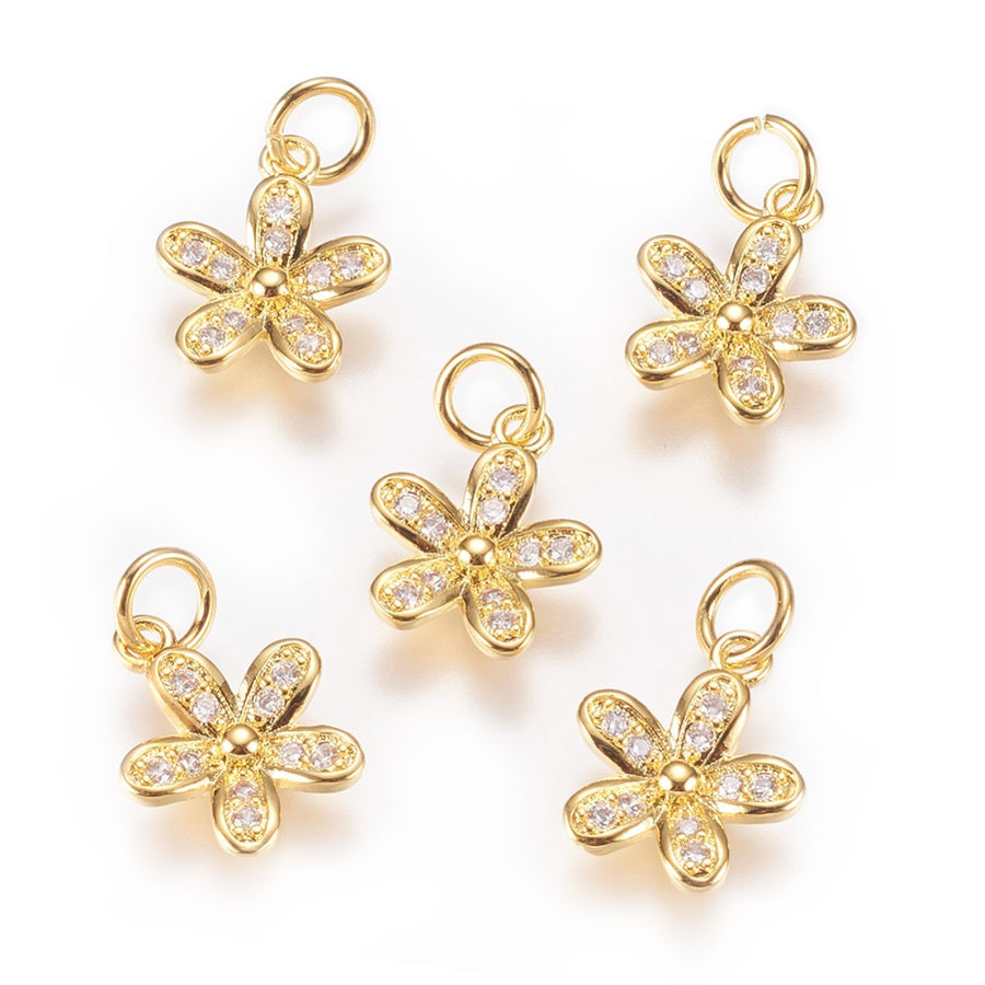 Brass Micro Pave Cubic Zirconia Golden Flower Charms, Gold Color with Clear Cubic Zirconia Charms for DIY Jewelry Making.   Size: 15mm Length, 10mm Width, 2mm Thick, Hole: 3mm, Quantity: 1pcs/package.  Material: Clear Cubic Zirconia Brass Micro Pave Charms with Jump Ring. Plated Gold Color. Shinny, Sparkle Finish. 