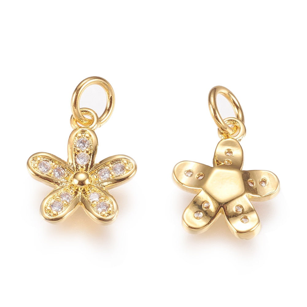Brass Micro Pave Cubic Zirconia Golden Flower Charms, Gold Color with Clear Cubic Zirconia Charms for DIY Jewelry Making.   Size: 15mm Length, 10mm Width, 2mm Thick, Hole: 3mm, Quantity: 1pcs/package.  Material: Clear Cubic Zirconia Brass Micro Pave Charms with Jump Ring. Plated Gold Color. Shinny, Sparkle Finish. 