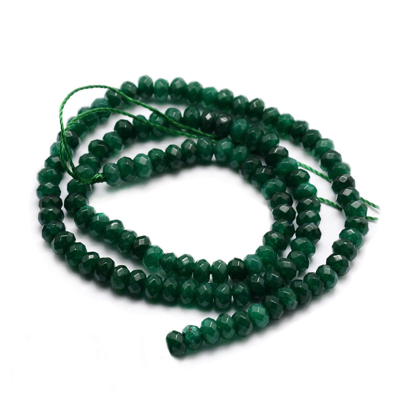 Faceted Green Jade Crystal Beads, Rondelle, Dark Green Color. Semi-Precious Gemstone Beads for DIY Jewelry Making.   Size: 4mm Diameter, 2-3mm Thick, Hole: 1mm; approx. 110pcs/strand, 14 Inches Long.  Material: Natural Malaysia Jade Beads, Green Color. Polished, Shinny Finish. 