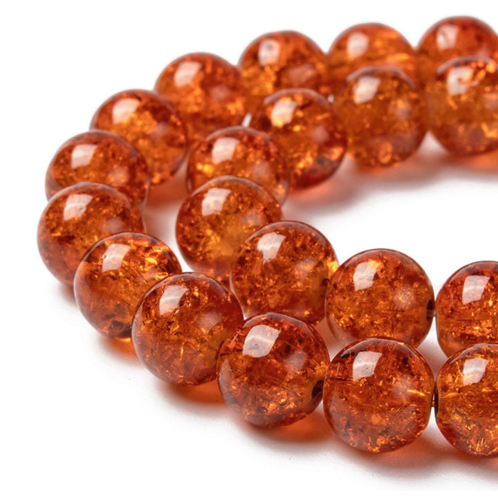 Popular Crackle Glass Beads, Round, Dark Orange Color. Glass Bead Strands for DIY Jewelry Making. Affordable, Colorful Crackle Beads. Great for Stretch Bracelets.  Size: 8mm Diameter Hole: 1.5mm; approx. 100pcs/strand, 31" Inches Long.  Material: The Beads are Made from Glass. Crackle Glass Beads, Dark Orange Colored Beads. Polished, Shinny Finish.