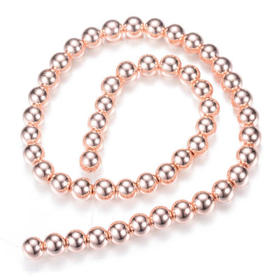 Stunning Rose Gold Hematite Spacer Beads, Electroplated Non-magnetic Synthetic Hematite Bead Strands, Round, Rose Gold Plated. Rose Gold Spacers for Jewelry Making.  Size: 4mm in diameter, hole: 1~1.5mm; approx. 92~95pcs/strand, 15.7 inches.  Material: Non-Magnetic Electroplated Rose Gold Hematite. Polished, Shinny Finish.  Bead Lot. beadlot. beadlotcanada. www.beadlot.com