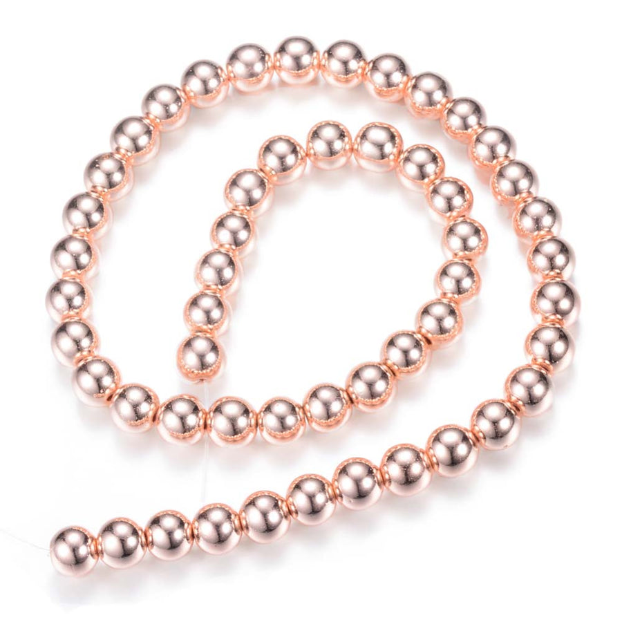 Rose Gold Hematite Spacer Beads, Electroplated Non-magnetic Synthetic Hematite Bead Strands, Round, Rose Gold Plated. Rose Gold Spacers for Jewelry Making.  Size: 6mm in diameter, hole: 1-1.5mm; approx. 67-70pcs/strand, 15.7 inches.  Material: Non-Magnetic Synthetic Electroplated Rose Gold Hematite Loose Spacer Beads. Rose Gold Plated Spacers. Polished, Shinny Finish.   