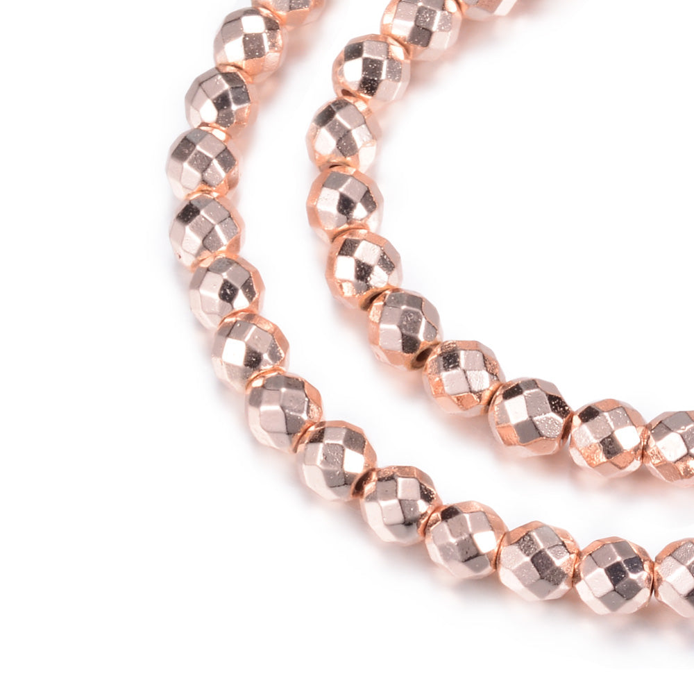 Electroplated Non-Magnetic Synthetic Hematite Beads, Rose Gold Color. Semi-Precious Stone Spacer Beads for Jewelry Making.   Size: 6mm Diameter, Hole: 1mm, approx. 62-65pcs/strand, 15" Inches Long.  Material: Non-Magnetic Synthetic Hematite Beads. Rose Gold Color Plated. Faceted, Round Spacer Beads. Polished, Shinny Metallic Lustrous Finish.