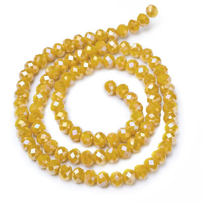 Electroplated Glass Crystal Beads, Faceted, Opaque Gold Color, Rondelle, AB Color Plated Glass Crystal Beads for Jewelry Making.  Size: 8mm Diameter, 6mm Thick, Hole: 1mm; approx. 65-68pcs/strand, 16" inches long.  Material: The Beads are Made from Glass. Electroplated Glass Crystal Beads, Rondelle, Dark Gold Yellow Color, AB Color Plated Beads. Polished, Shinny Finish.