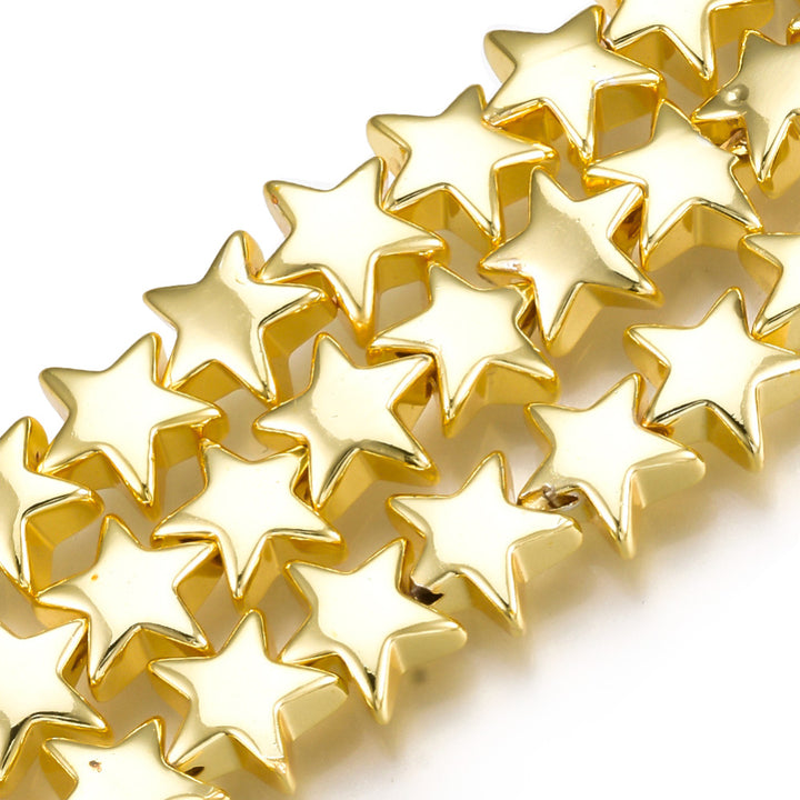 Non-Magnetic Star Shaped Synthetic Hematite Beads, Gold Color. Semi-Precious Stone Spacer Beads for Jewelry Making.   Size: 8mm Length, 8mm Width, 3.5mm Thick, Hole: 1mm, approx. 65-67pcs/strand, 15" Inches Long.  Material: Non-Magnetic Synthetic Hematite Beads. Gold PlatedStar Shaped Spacer Beads. Polished, Shinny Metallic Lustrous Finish.