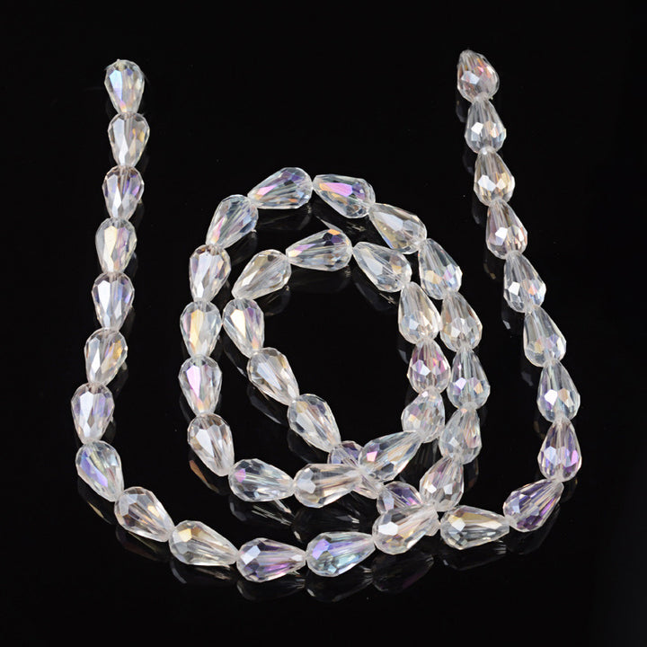 Transparent Teardrop Crystal Glass Beads, Faceted, AB Color Plated Plated Clear Color, Glass Crystal Beads for Jewelry Making.  Size: 15mm Length, 10mm Thick, Hole: 1.5mm; approx. 48pcs/strand, 30" inches long.  Material: The Beads are Made from Glass. Electroplated Glass Crystal Beads, Teardrop Shaped, AB Color Plated Plated Clear Colored Beads. Polished, Shinny Finish.