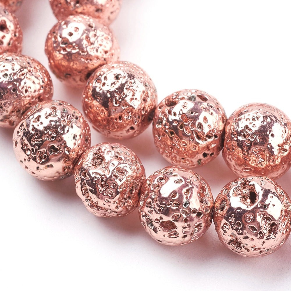 Electroplated Natural Lava Rock Bead Strands, Round, Bumpy, Rose Gold Color. Semi-Precious Stone Beads for DIY Jewelry Making. Perfect Accent Piece for Stretch Bracelets.  Size: 8-8.5mm Diameter, Hole: 1mm; approx. 47pcs/strand, 15.35 inches long. www.beadlot.com