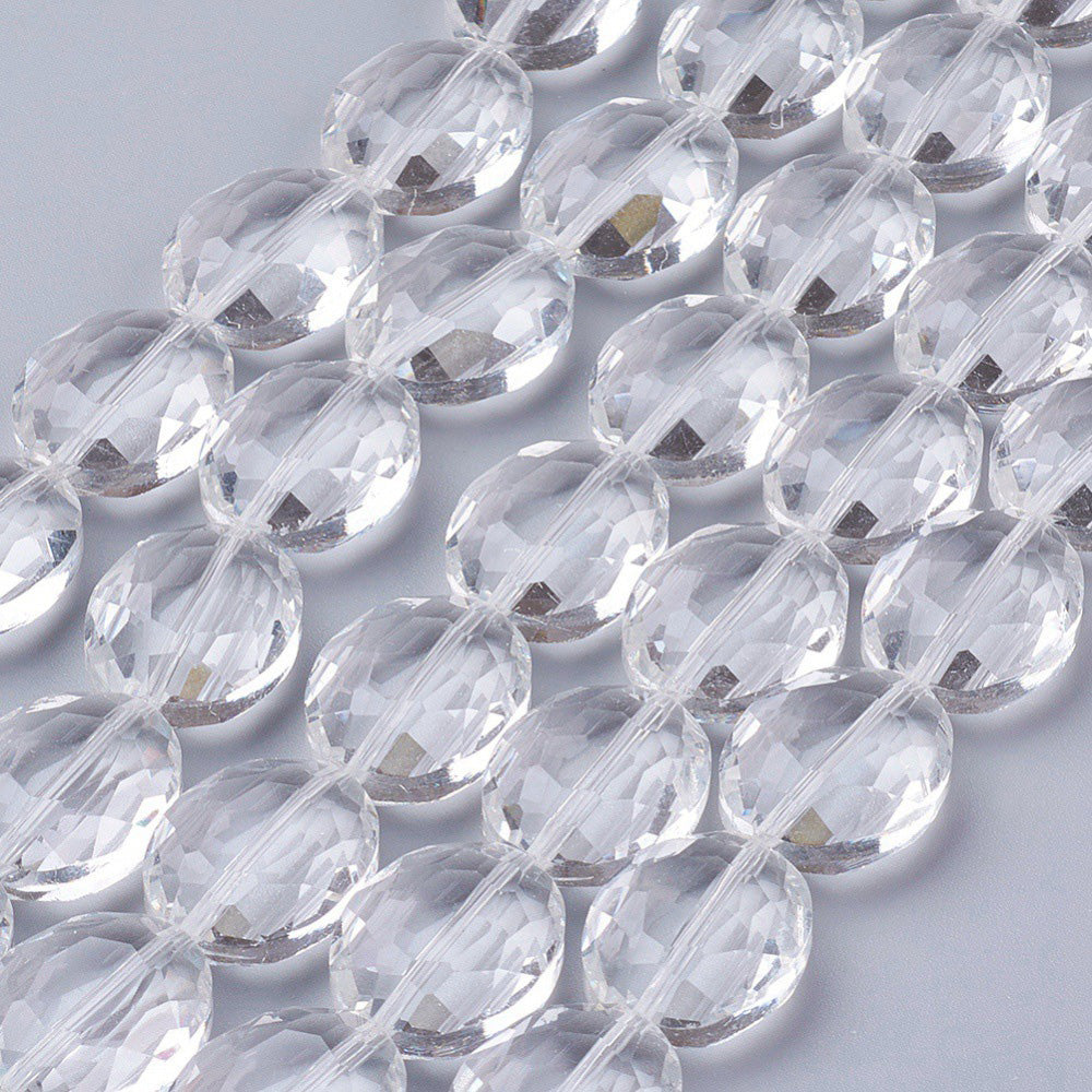 Transparent Faceted Glass Crystal Beads, Oval Shape, Crystal Clear Color.   Size: 20mm Length, 16mm Width, 10mm Thick, , Hole: 1mm, approx. 20pcs/strand  Material: Glass; Austrian Crystal Imitation.  Shape: Oval, Faceted  Color: Clear  Usage: Focal Beads for DIY Jewelry Making.