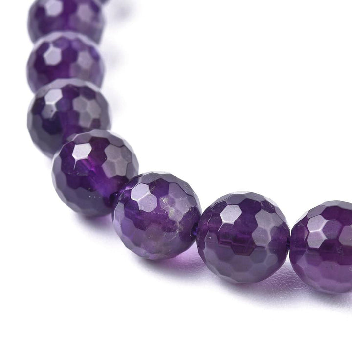 Faceted Natural Amethyst Beads, Round, Purple Color. Semi-Precious Gemstone Beads for DIY Jewelry Making. Gorgeous, Faceted Amethyst Beads.  Size: 8mm Diameter, Hole: 1mm; approx. 22pcs/strand, 7.5 Inches Long.  Material: Genuine Natural Amethyst Beads, High Quality Faceted Beads. Purple Color. Polished, Shinny Finish.