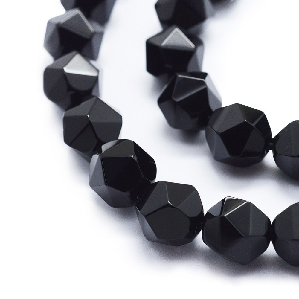 Faceted Oval Black Onyx Beads, Black Color. Semi-Precious Gemstone Beads for DIY Jewelry Making.  Size: 10mm Length, 9mm Width; Hole: 1mm; approx. 37-39pcs/strand, 15" Inches Long.  Material: High Quality Natural Black Onyx, Faceted, Oval, Dyed Black Color. Polished Finish.