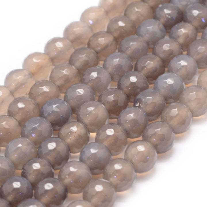 Faceted Grey Agate Natural Agate Beads, Round, Grey Color. Faceted, Round Semi-Precious Gemstone Beads for Jewelry Making.  Size: 6mm Diameter, Hole: 1mm; approx. 60-63pcs/strand, 14" Inches Long.  Material: Faceted Round Natural Grey Agate. High Quality Stone Beads. Polished Finish.