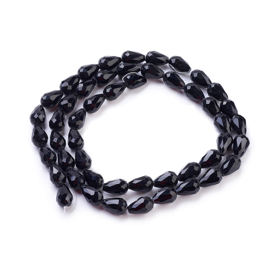 Teardrop Crystal Glass Beads, Faceted, Smoky Black Color, Glass Crystal Bead Strands. Shinny, Premium Quality Crystal Beads for Jewelry Making.  Size: 15mm Length, 10mm Thick, Hole: 1.5mm; approx. 48pcs/strand, 30" inches long.  Material: The Beads are Made from Glass. Glass Crystal Beads, Teardrop Shaped, Light Smoke Black Colored Beads. Polished, Shinny Finish.