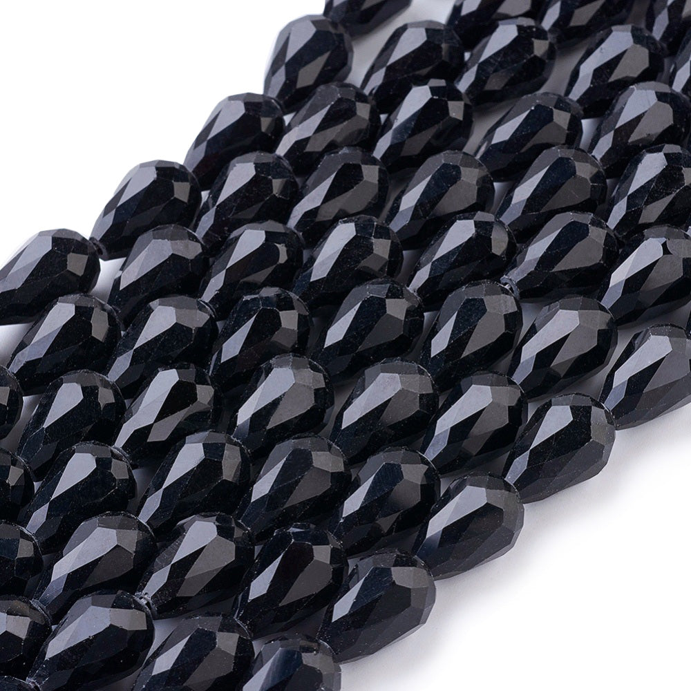 Teardrop Crystal Glass Beads, Faceted, Smoky Black Color, Glass Crystal Bead Strands. Shinny, Premium Quality Crystal Beads for Jewelry Making.  Size: 15mm Length, 10mm Thick, Hole: 1.5mm; approx. 48pcs/strand, 30" inches long.  Material: The Beads are Made from Glass. Glass Crystal Beads, Teardrop Shaped, Light Smoke Black Colored Beads. Polished, Shinny Finish.