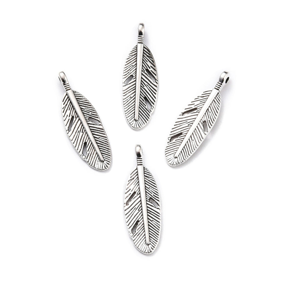 Silver Sunflower Charm Beads, Antique Silver Colored Vintage Feather Charms for DIY Jewelry Making. Feather Charms for Bracelet and Necklace Making.  Size: 29mm Length, 9.5mm Width, 2.5mm Thick, Hole: 1.8mm, Quantity: 10 pcs/package.  Material: Alloy (Lead and Nickel Free) Feather Charms. Antique Silver Color. Shinny Finish.