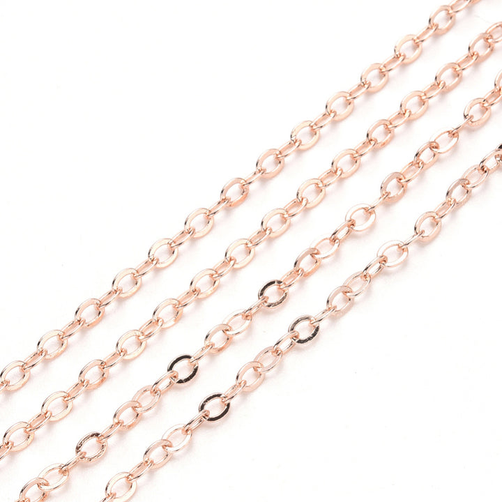 Brass Cable Chain, Rose Gold Color Brass Soldered Cable Chains for making DIY Jewelry.  Color: Rose Gold  Size: 2.2x1.9x0.3mm sold per/10m Roll (32.8 Feet)  Material: Brass Soldered Cable Chain Roll with Spool, Flat, Oval, Rose Gold Color Chain.